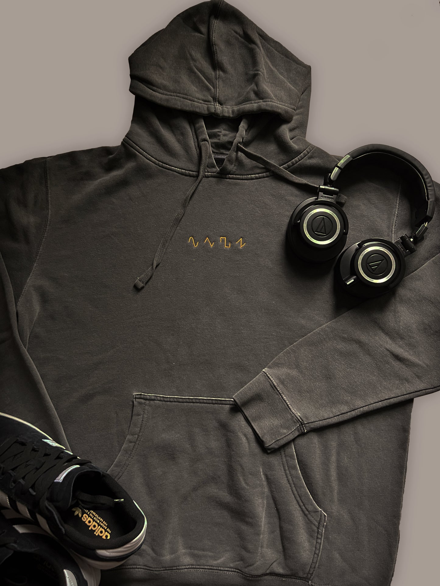 Dezolent Basic Shapes Black Pigment Dyed Hoodie with Audio Technica Headphones and Adidas Sneakers: Sine wave, Triange Wave, Square Wave, Sawtooth Wave