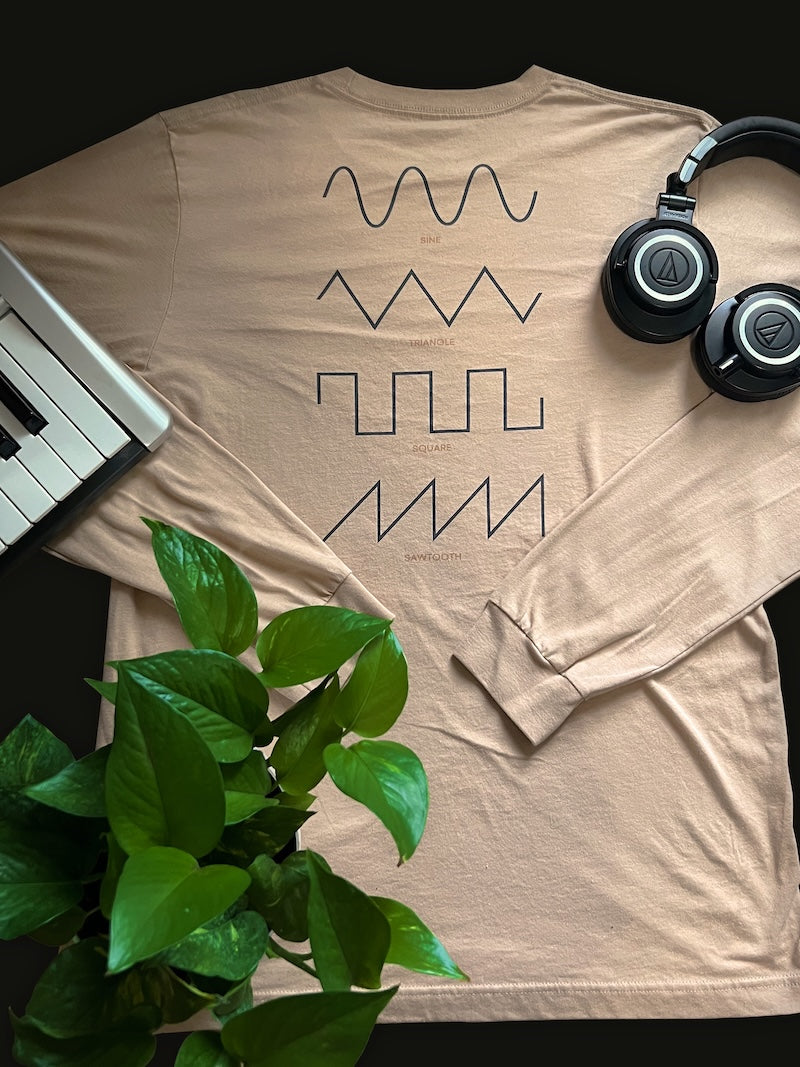 Dezolent Basic Shapes Creme Dune Long Sleeve T-Shirt with Audio Technica Headphones, Midi Keyboard, and Plant: Sine Wave, Triangle Wave, Square Wave, Sawtooth Wave